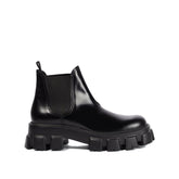 Prada Monolith Leather Ankle Boots